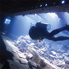 Underwater photographer Stuart Green, diver inside the Marcos