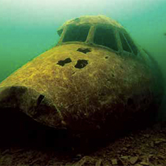 Underwater photographer Spencer Burrows, plane